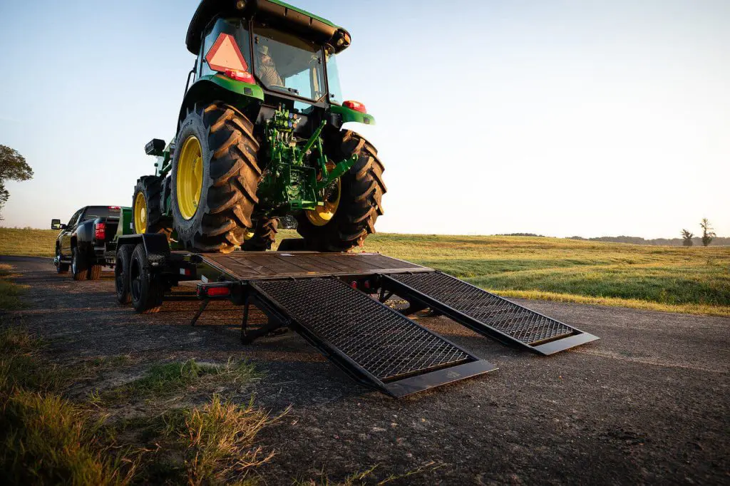 tractor on a trailer with superwide mega ramps